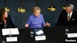 Democratic U.S. presidential candidate Hillary Clinton (C) speaks during a campaign event in Hampton, Virginia, June 15, 2016. Clinton blasted Trump at the event, saying that “A ban on Muslims would not have stopped [the Orlando] attack."