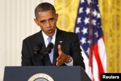 U.S. President Barack Obama is seen speaking at a news conference at the White House in Washington in this August 9, 2013, file photo.