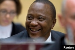 FILE - Kenya's President Uhuru Kenyatta