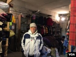 Viktor Tukaylo escaped Donbas after his home was shelled. Readjusting to life in another part of the country has been difficult, but he says 'we're surviving.' (L. Ramirez/VOA)