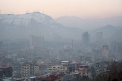 This photograph taken on January 17, 2019, shows a general view of residential areas amid heavy smog conditions in Afghanistan's capital Kabul.