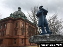 The massive red brick Grant County Courthouse towers over Lancaster’s main square. On the streets, shoppers spending time and money in Walker's Clothing and Shoes, a jewelry store, drug store, gift shops and restaurants.