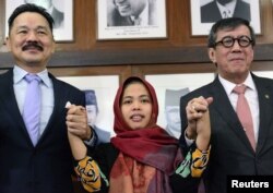 Indonesian Siti Aisyah, accused in the 2017 killing of the North Korean leader's half-brother Kim Jong Nam, and who was freed by a Malaysian court, attends a news conference at the Indonesian embassy in Kuala Lumpur, Malaysia March 11, 2019. REUTERS/Strin