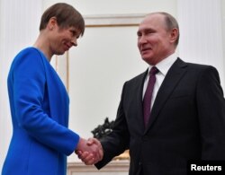 Russian President Vladimir Putin meets with his Estonian counterpart, Kersti Kaljulaid, at the Kremlin in Moscow, April 18, 2019.