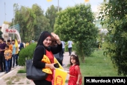 At a rally for Kurdish candidates, some voters say these elections are critical for ensuring future negotiations regarding the rights of minorities, in Irbil, Iraq, May 10, 2018.