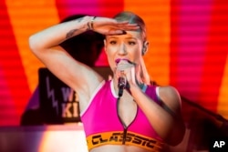 Iggy Azalea performs on stage during the Pandora Presents The 2014 Summer Party at The Santa Monica Pier on Aug. 09, 2014, in Santa Monica, Calif.