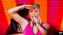 Iggy Azalea performs on stage during the Pandora Presents The 2014 Summer Party at The Santa Monica Pier on Aug. 09, 2014, in Santa Monica, Calif.