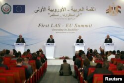 European Commission President Jean-Claude Juncker, European Council President Donald Tusk, Abdel Fattah el-Sissi, President of Egypt and Ahmed Aboul Gheit, Arab League's secretary general, attend a news conference during a summit between Arab league and European Union member states, in the Red Sea resort of Sharm el-Sheikh, Egypt, Feb. 25, 2019.