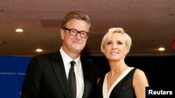 FILE - MSNBC's Joe Scarborough and Mika Brzezinski arrive for the annual White House Correspondents' Association dinner in Washington, April 25, 2015.