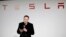 FILE - Elon Musk, CEO of Tesla Motors Inc., talks during a news conference at the company's headquarters in Fremont, California, Sept. 29, 2015.