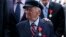 FILE - Benjamin B. Ferencz pose for a picture after he received the Legion of Honor Insignia from French minister of Defense Jean-Yves Le Drian during an awards ceremony to honor World War II veterans in New York, July 3, 2015.