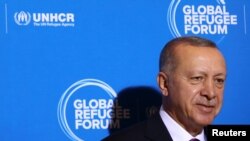 Turkey's President Recep Tayyip Erdogan arrives for the Global Refugee Forum at the United Nations in Geneva, Switzerland, Dec. 17, 2019.