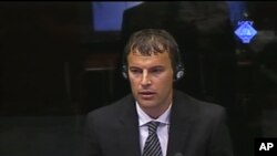 Britain's Prince William and his wife Kate hold the Prince of Cambridge, July 23, 2013, outside the exclusive Lindo Wing at St. Mary's Hospital in London where the Duchess gave birth.