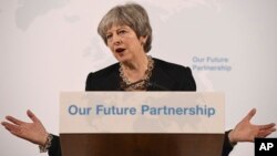 Perdana Menteri Inggris berbicara di kediaman walikota London di Mansion House, Jumat (2/3). 