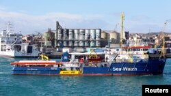 FILE - The migrant search and rescue ship Sea-Watch 3 arrive at the port of Catania, Italy, Jan. 31, 2019. 