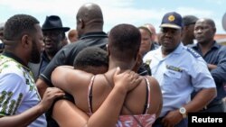 Yan Sanda a wurin da aka yi harbi a kasar Afirka ta Kudu