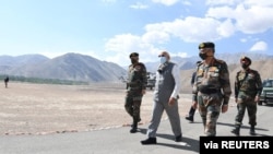 FILE - India's Prime Minister Narendra Modi visits Himalayan region of Ladakh, July 3, 2020. 