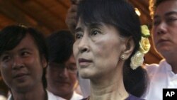 Burma's opposition leader Aung San Suu Kyi during the opening ceremony of a photo exhibition entitled "Aung San Suu Kyi, The Burmese Way to Democracy" at Institute of French in Rangoon, May 17, 2012. 