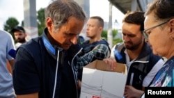 Wakaguzi kutoka Shirika la Nguvu za Atomic IAEA wakiwa katika kinu cha nishati ya nyuklia cha Zaporizhzhia.