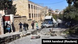 A view shows the damage outside a school after shelling by Syrian rebels on government-held western Aleppo, Syria, Nov. 20, 2016. 