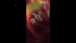 Raw Video Footage: Pedestrian on Skywalk as Bangkok Bomb Explodes