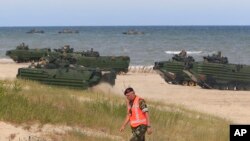 NATO troops make massive amphibious landing during sea exercises to reassure Baltic Sea region allies in the face of a resurgent Russia, in Ustka, Poland, June 17, 2015.