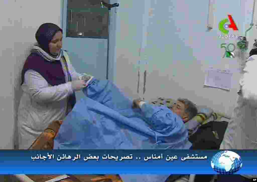 An unidentified former hostage receives treatment in a hospital in Ain Amenas, Algeria, in this image taken from television, January 18, 2013. (Canal Algerie)