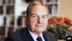 FILE - In this April 31, 1981, file photo, David Rockefeller poses for a photograph. The billionaire philanthropist who was the last of his generation in the famously philanthropic Rockefeller family died, March 20, 2017, according to a family spokesman. 