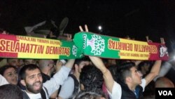 Pro-Kurdish People's Democratic Party (HDP) supporters are seen celebrating their party's strong showing, June 8, 2015, (S. Turan/VOA).