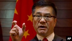 Outgoing U.S. ambassador to China, Gary Locke gestures as he speaks during a farewell press conference held at the U.S. Embassy in Beijing, Feb. 27, 2014.