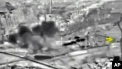 រូបភាព​នេះ​បង្ហាញ​ពី​ការ​ផ្ទុះ​គ្រាប់​បែក​នៅ​ក្នុង​ប្រទេស​ស៊ីរី​ ដែល​បង្ហោះ​កាលពី​ថ្ងៃទី​២ ខែតុលា ឆ្នាំ២០១៥។