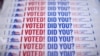 FILE - Wristbands for voters are ready at a polling station during early voting in Chicago, Illinois, Oct. 14, 2016. 