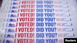 FILE - Wristbands for voters are ready at a polling station during early voting in Chicago, Illinois, Oct. 14, 2016. 