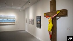 An artwork called "McJesus," which was sculpted by Finnish artist Jani Leinonen and depicts a crucified Ronald McDonald, is seen on display as part of the Haifa museum's "Sacred Goods" exhibit, in Haifa, Israel, Jan. 14, 2019. 