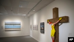 An artwork called "McJesus," which was sculpted by Finnish artist Jani Leinonen and depicts a crucified Ronald McDonald, is seen on display as part of the Haifa museum's "Sacred Goods" exhibit, in Haifa, Israel, Jan. 14, 2019. 
