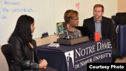Bina48, her partner Alex Rodriguez and Bruce Duncan speaking at Notre Dame de Namur University.