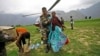 Bad Weather Hampers India Flood Rescue Effort 