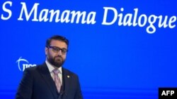 Afghanistan National Security Council advisor, Hamdullah Mohib addresses the Manama Dialogue security conference in the Bahraini capital on Dec. 5, 2020.
