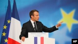French President Emmanuel Macron delivers a speech on the European Union at the amphitheater of the Sorbonne university in Paris, France, Sept. 26, 2017.