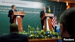 U.S. Secretary of State Antony Blinken, left, and Mexico's Foreign Secretary Marcelo Ebrard hold a joint news conference in Mexico City on Oct. 8, 2021.