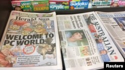 A newspaper stand displays the Herald Sun newspaper, featuring a controversial cartoon of Serena Williams, in Melbourne, Sept. 12, 2018. 