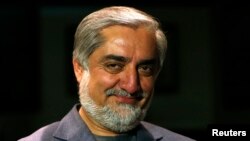 Afg'oniston sobiq tashqi ishlar vaziri Abdulla Abdulla, prezidenltikka sakkiz nomzoddan biri, Kobul, 9-aprel, 2014-yil