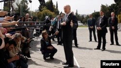 Britain's Foreign Secretary William Hague speaks to journalists during an informal meeting of EU foreign ministers in Athens April 4, 2014. 