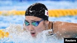 Perenang remaja timnas Jepang, Rikako Ikee, bertanding di nomor renang gaya kupu-kupu 100 meter putri di Asian Games, Jakarta, 21 Agustus 2018.