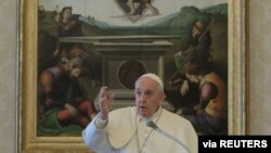 Pope Francis delivers the weekly Angelus prayer as it is streamed via video over the internet from inside the Vatican, March 29, 2020.
