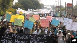 FILE - Pakistani women stage a rally to protest against domestic violence and sexual harassment as well as to demand greater economic opportunities. 