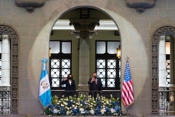 Vice President Kamala Harris and Guatemalan President Alejandro Giammattei pose for an official photograph, June 7, 2021, at the National Palace in Guatemala City.