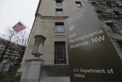 FILE - A view of the Department of Justice building in Washington, Feb 1, 2018.