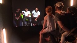 Iraqi refugees living at a refugee camp and festival attendees in Washington interact directly through a digital portal called Shared Studio, which was set up at the One Journey festival in last June.