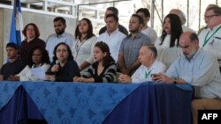 Nicaraguan Azaleah Solis (3-L), member of the opposition Civic Alliance for Justice, speaks during a press conference in Managua, March 19, 2019.